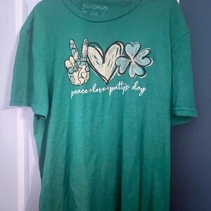 Green Graphic Tee with Peace Love Patty's Day Design perfect for St. Patrick’s